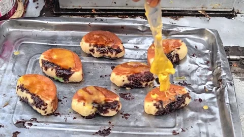 The process of making pukis cake or pancong cake, a traditional cake 動画素材 339274963