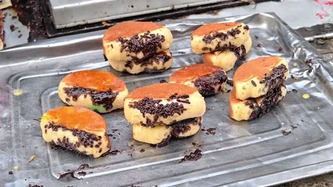The process of making pukis cake or pancong cake, a traditional cake Stock Footage 339275000