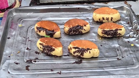 The process of making pukis cake or pancong cake, a traditional cake Vídeos de archivo 339275003