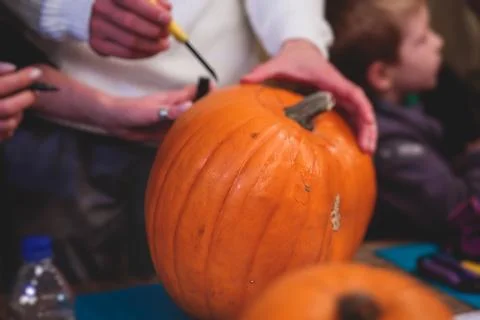 Process of making pumpkin lantern for halloween party, glowing jack-o-lante.. Stock Photos