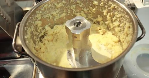 The process of making puree in a blender. The moment of salting. Stock Photos