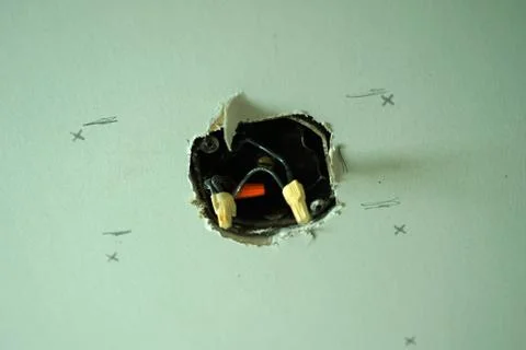 On process of making ready cables for power socket or electrical outlets. Stock Photos