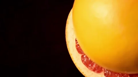 Process of making a red grapefruit halves with stuffed with tobacco for a Stock-Footage 150061604