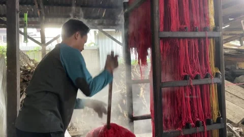 The process of making red noodles, a traditional Indonesian food Stock Footage 291279094