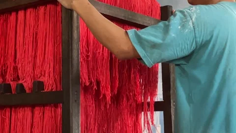 The process of making red noodles, a traditional Indonesian food Video stock 291279126