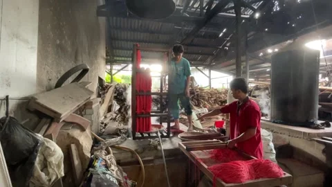 The process of making red noodles, a traditional Indonesian food Video stock 291279186
