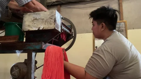 The process of making red noodles, a traditional Indonesian food Video stock 291279225