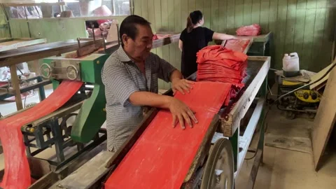 The process of making red noodles, a traditional Indonesian food Video stock 291279268