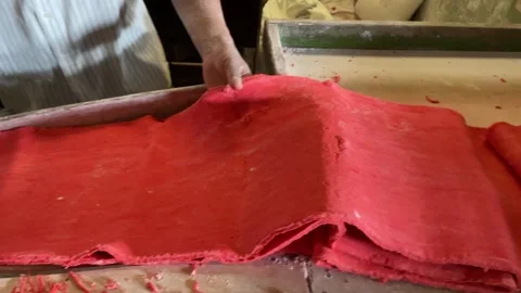 The process of making red noodles, a traditional Indonesian food Video stock 291279293