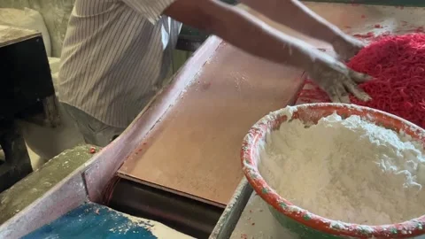 The process of making red noodles, a traditional Indonesian food Video stock 291279326