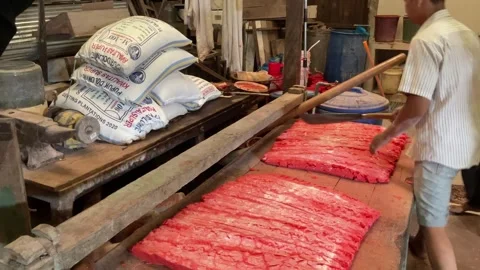 The process of making red noodles, a traditional Indonesian food Video stock 291279366