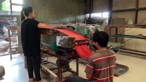 The process of making red noodles, a traditional Indonesian food Video stock 291279367