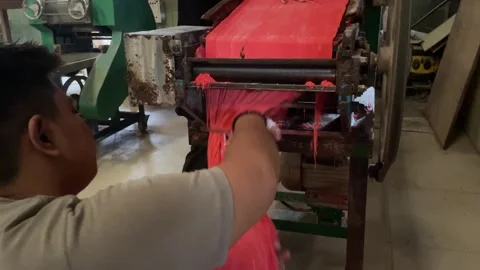 The process of making red noodles, a traditional Indonesian food Video stock 291279377