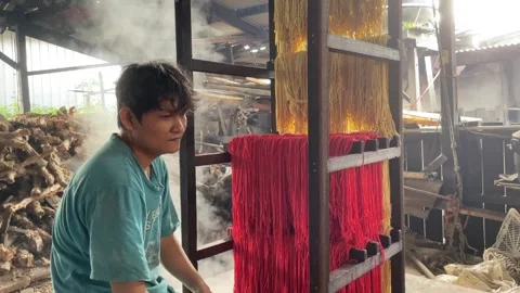 The process of making red noodles, a traditional Indonesian food Video stock 291279421