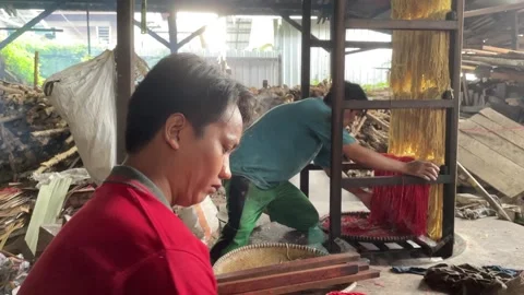 The process of making red noodles, a traditional Indonesian food Stock Footage 291279474