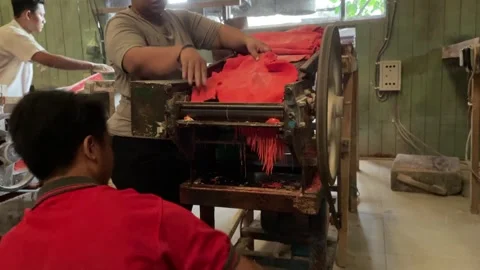 The process of making red noodles, a traditional Indonesian food Stock Footage 291279549