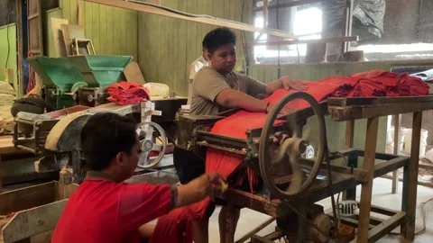 The process of making red noodles, a traditional Indonesian food Stock Footage 291279572