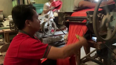 The process of making red noodles, a traditional Indonesian food Stock Footage 291279593