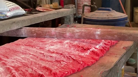 The process of making red noodles, a traditional Indonesian food Stock Footage 291279597