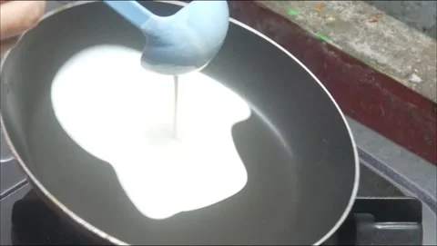 The process of making risol skin food in a Teflon pan Stock Footage 324532055