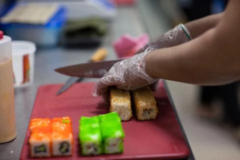 The process of making rolls in the real kitchen Stock Photos