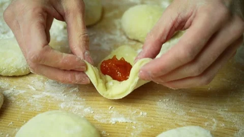 The process of making round donut with jam Stock Footage 221181005