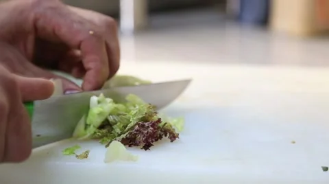 Process Of Making Salad From Fresh Vegetables On A Cutting Board Stock Footage 54924831