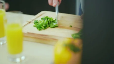 Process of making salad from fresh vegetables on a cutting board Stock-Footage 75934321