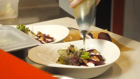 The process of making salads in a restaurant. Fresh Vegetable and Seafood Sal Stock Footage 119361079