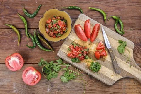In the process of making salsa. Stock Photos