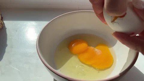Process of making a scrambled egg omelet Woman preparing homemade omelette Stock Footage 317222469
