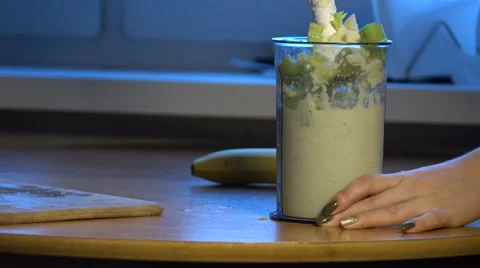 The process of making a smoothie  Stock Footage 62180078