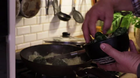 The process of making sorrel sauce, in a skillet on the stove top roast sorrel l Stock Footage 289179115