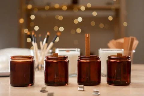Process of making soy wax candles in workshop. Stock Photos