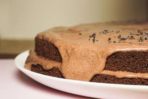 The process of making sponge chocolate cake with coffee cream. Stock Photos