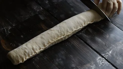 The process of making sweet cinnamon rolls. Cooking. Bakery products. Stock Footage 147547331