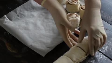 The process of making sweet cinnamon rolls. Cooking. Bakery products. Stock Footage 147547384