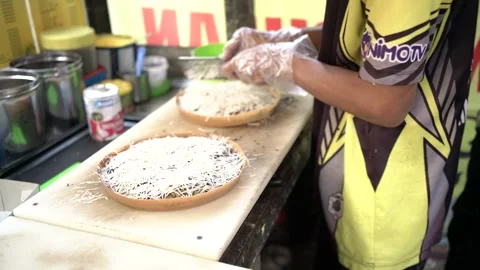 Process of making sweet martabak. Stock Footage 254411320