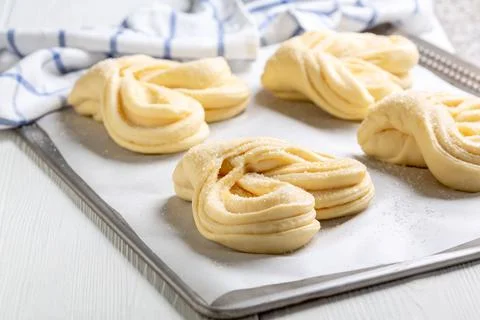 Process of making swirling buns. Stock Photos