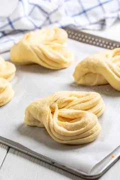 Process of making swirling buns. Stock Photos