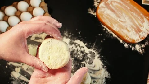 Process of making syrniki. Step 10 - form round syrniki from curd dough. Top Stock Footage 311190261