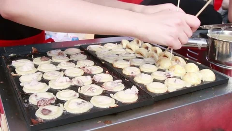 The process of making Takoyaki famouse japanese street food Stock Footage 80996853