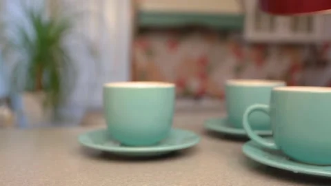 The process of making tea. Pouring hot water from the kettle Stock Footage 153803586