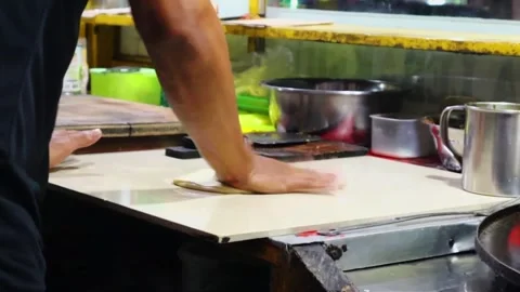 The process of making thin sheets of wheat flour as a basic ingredient Video stock 255843251
