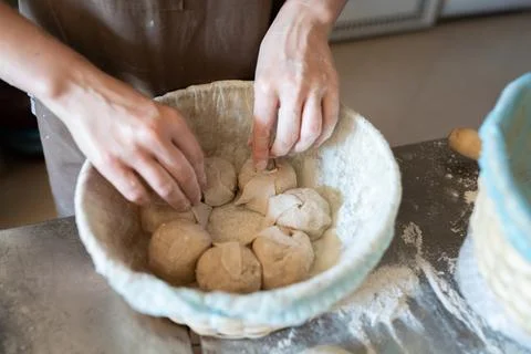 The process of making traditional French bread in Stock Photos