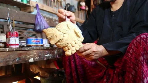 The process of making traditional wooden puppet shows from wood Stock Footage 139387503