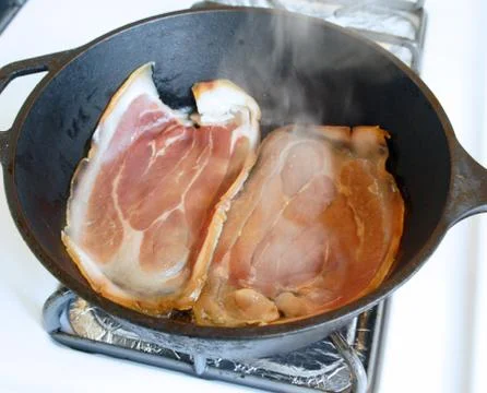 The process of making two pieces of beef meat Stock Photos