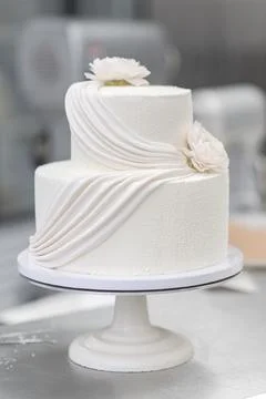 Process making white wedding cake Stock Photos