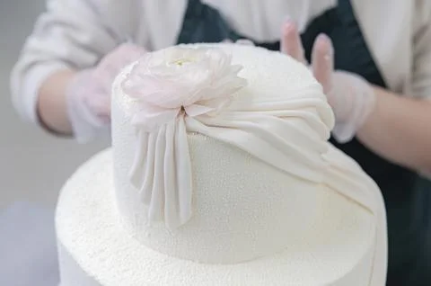 Process making white wedding cake Stock Photos