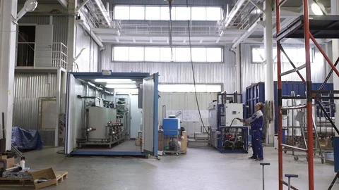 The process of managing a bridge crane in an assembly shop Stock Footage 92864913